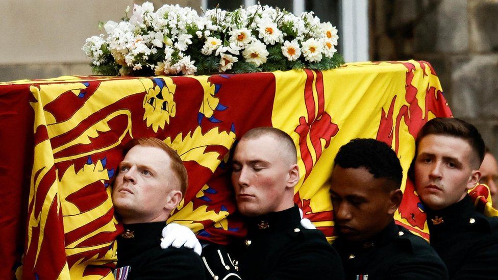 Pallbearers carrying the coffin of Queen Elizabeth II