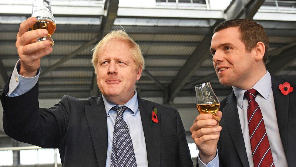 Boris Johnson alongside Douglas Ross
