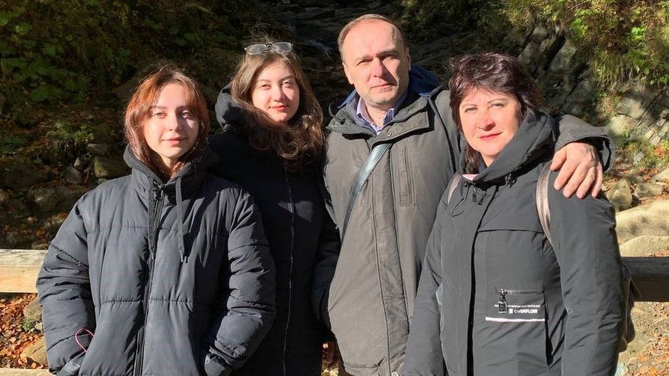 Svitlana and Yulia Derkach with their parents in Ukraine