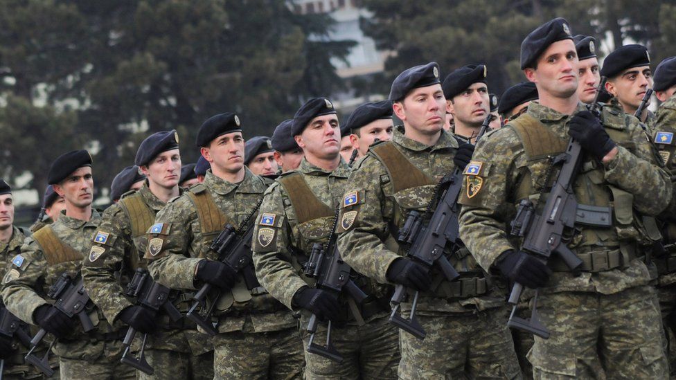Members of Kosovo's security forces parade a day before parliament's vote on whether to form a national army, in Pristina, Kosovo, December 13, 2018