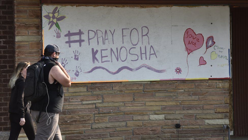 A sign reading "Pray for Kenosha" in Wisconsin