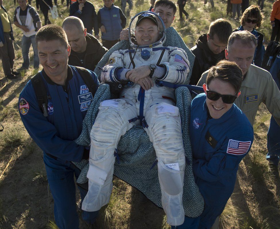 Scott Tingle is carried from the capsule. 3 June 2018