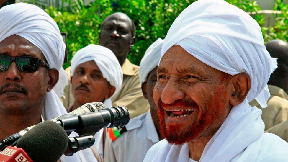 Sudanese top opposition leader and former premier Sadiq al-Mahdi addresses worshippers during Eid al-Fitr prayer marking the end of the Muslim holy fasting month of Ramadan on June 5, 2019 in Omdurman, just across the Nile from the capital Khartoum.