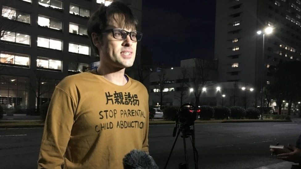 Scott McIntyre speaks outside court