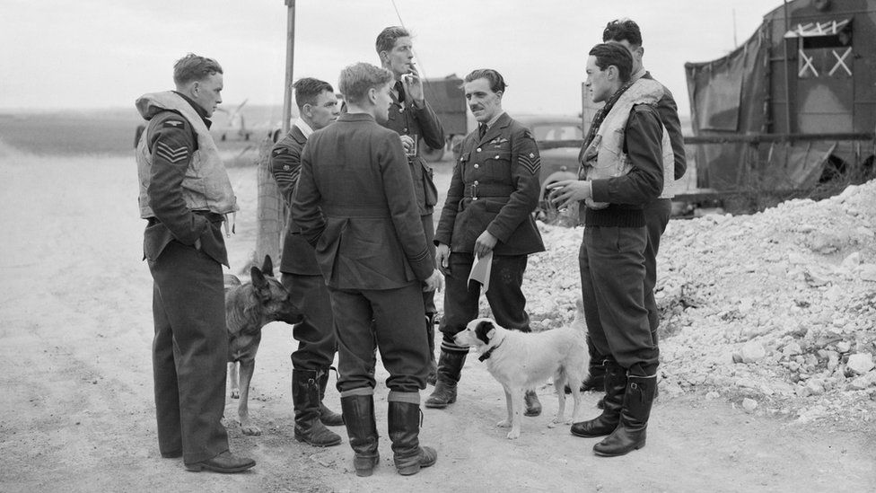 Pilots of the Duxford Wing relax with drinks at Fowlmere