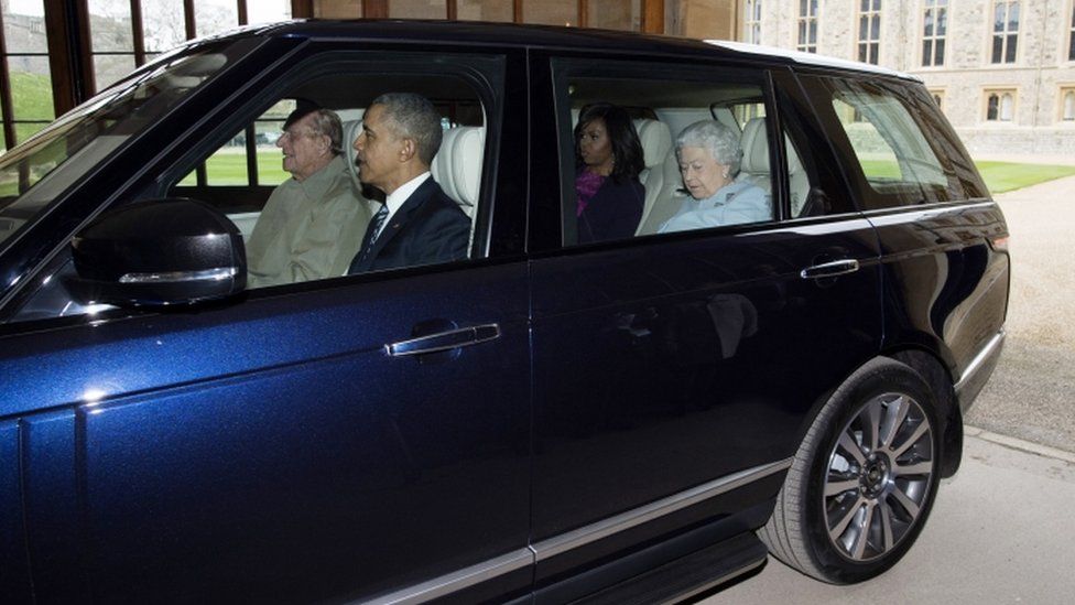 The Duke of Edinburgh driving a car with the Queen, Barack Obama and Michelle Obama