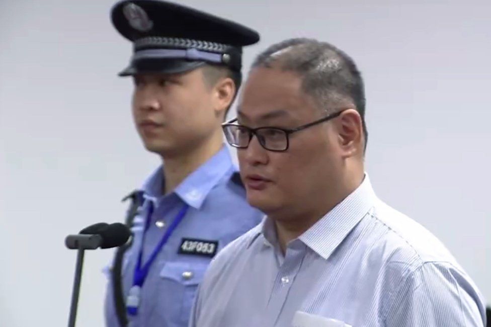 Screengrab of Lee Ming-che's trial in Hunan province