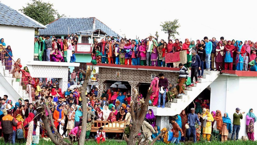 Villagers gather in large numbers as body of slain Central Reserve Police Force (CRPF) soldier Tilak Raj arrives at his home in village Dhewa Jandroh, some 90km from Dharamsala