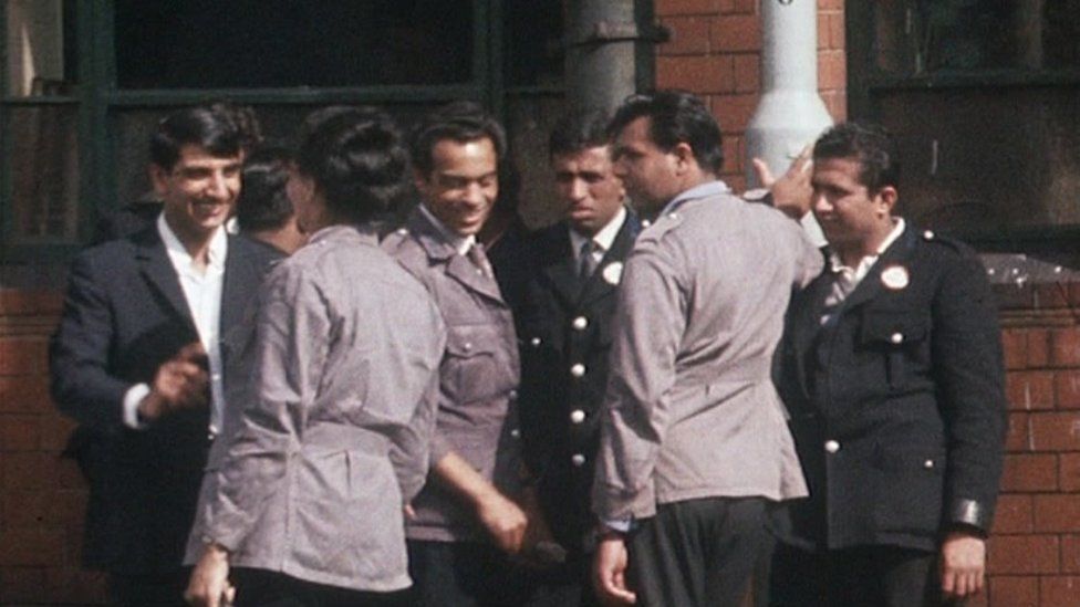 Bus drivers and conductors outside Wolverhampton bus depot in 1960s