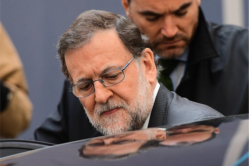Spanish Prime Minister Mariano Rajoy leaves at the end of European Union leaders summit in Brussels, 21 October