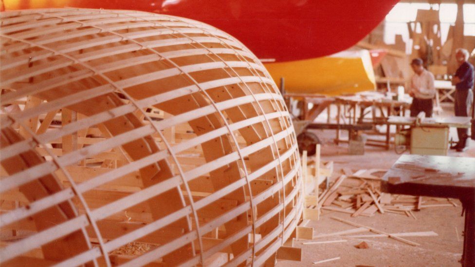 The wooden hull of a Ruffian 23 as it is being constructed