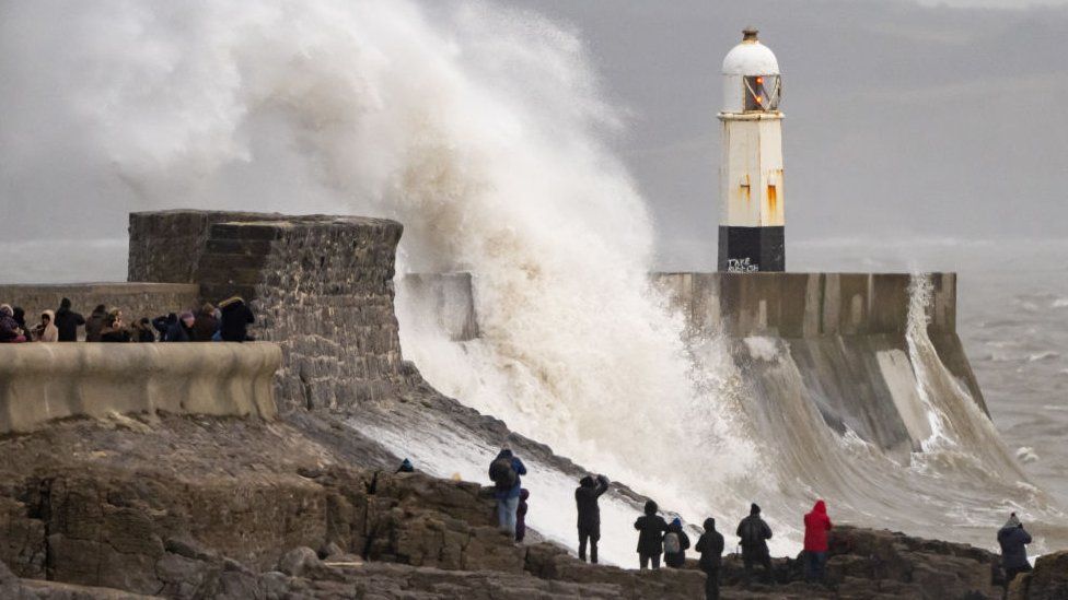 Large waves hit the sea wall at Porthcawl, Bridgend county, as Storm Isha lashed the country