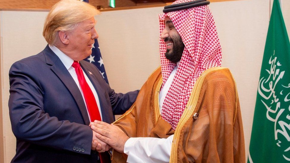 Saudi Arabia's Crown Prince Mohammed bin Salman shakes hands with US President Donald Trump, at the G20 leaders summit in Osaka, Japan