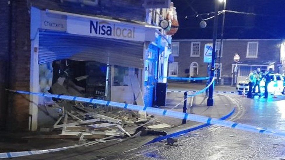 Ramraiders use digger in Brandon cash machines theft bid BBC News Ramraiders use digger in Brandon cash machines theft bid BBC News