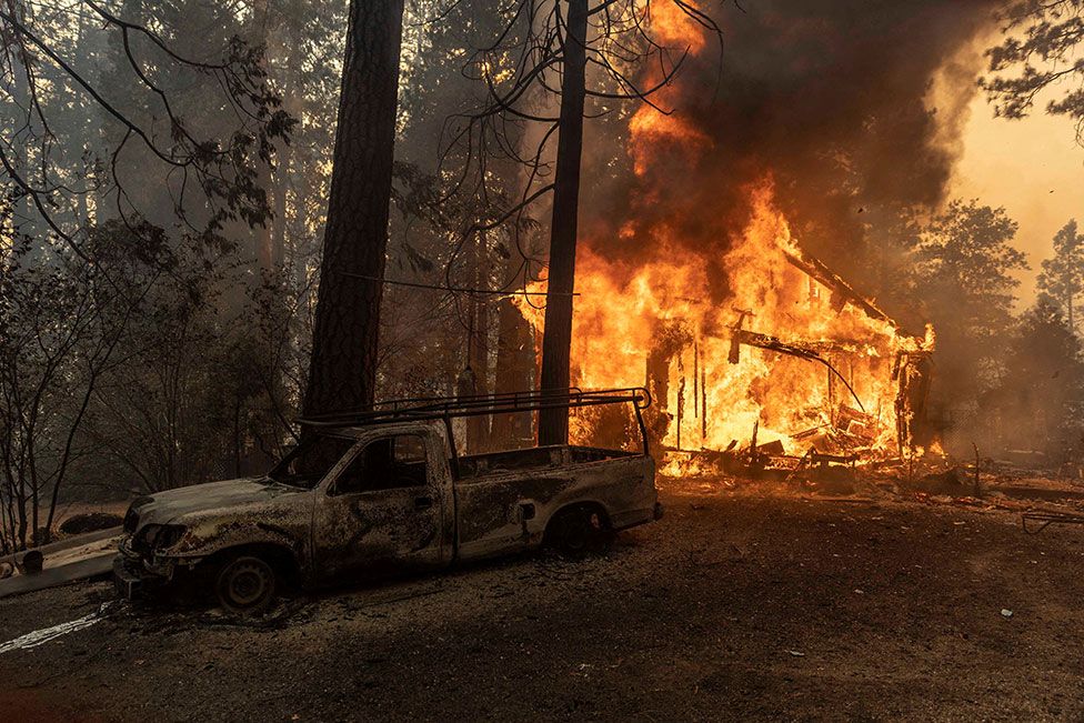 A house is on fire as the Oak Fire burns near Darrah in Mariposa County, California, US., on 23 July 2022