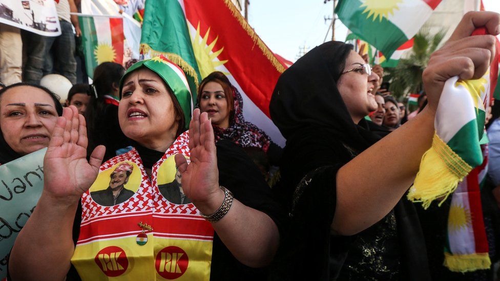 Iraqi Kurds take part in a demonstration outside the US consulate in Irbil on 21 October 2017