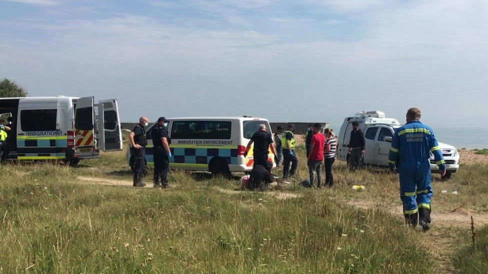 Migrants and Border Force officers in Kingsdown