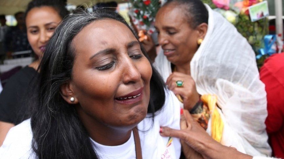Senait Zaro, reacts as she meets her family for the first time in fifteen years, at Asmara International Airport, who arrived aboard the Ethiopian Airlines ET314 flight in Asmara, Eritrea July 18, 2018