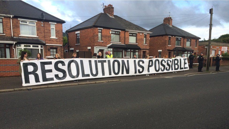 Nationalist residents' groups held protests against the parade on both sides of the road in Ardoyne