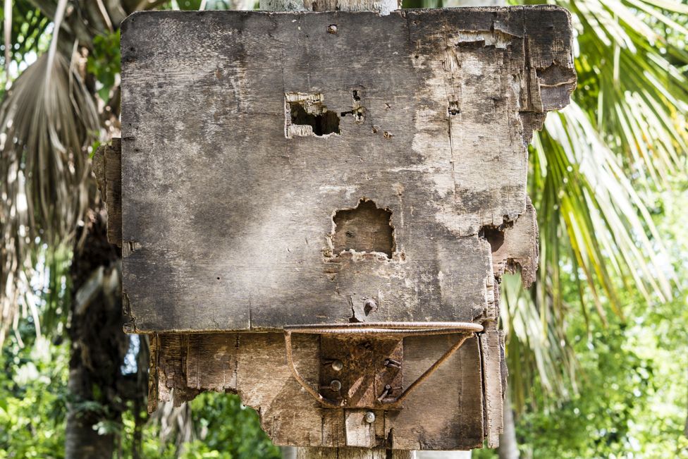 A damaged basketball hoop and backboard in the Visayan Region of the Philippines
