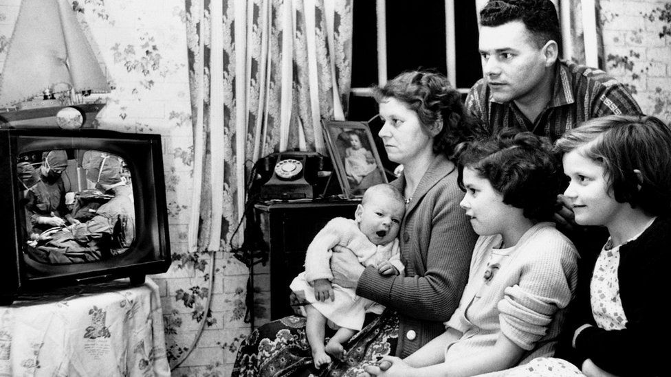 The Freeman family watches the Caesarean birth of Mark Freeman on a B.B.C. documentary on television 1936
