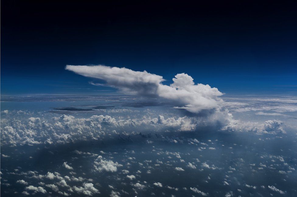 A cloud seen from a plane's cockpit
