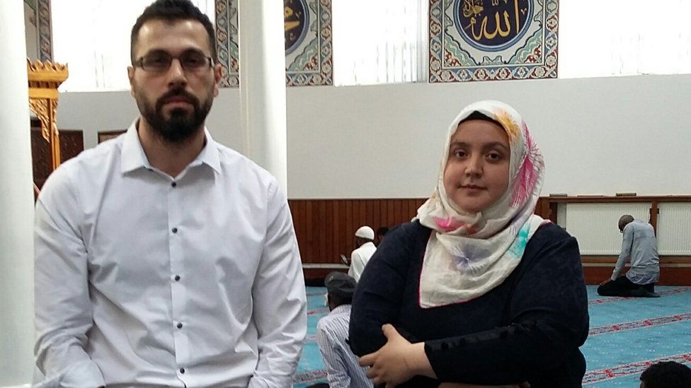 Ozcan Keles, a member of the mosque and chairperson of the Gulen-inspired charity Dialogue Society and Seval Gokce, the mosque's executive director