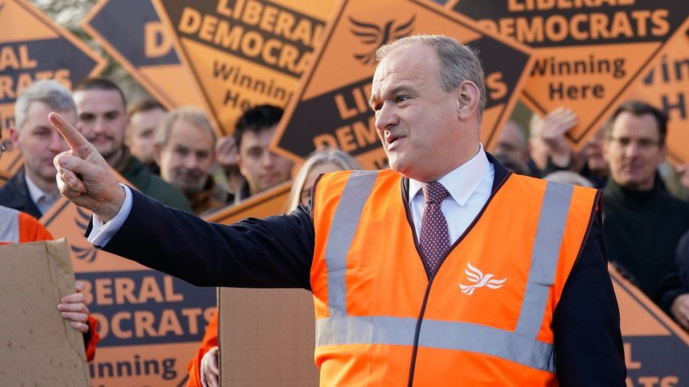 Liberal Democrat leader Sir Ed Davey during a rally in Guildford, as he unveils a new campaign poster vowing to "tear down the Blue Wall and get rid of this appalling Conservative government".