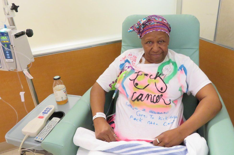 Nedra wearing a handmade T-shirt to receive a chemo treatment