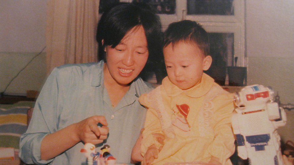 Yuwen Wu with her young daughter.