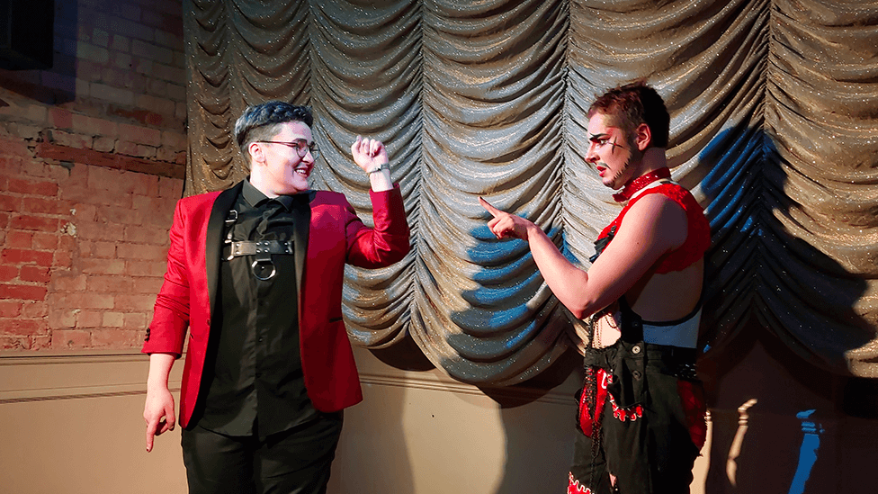 Drag Kings Victor Velvet and Rex Cherry face off against each other in a lip-synching game