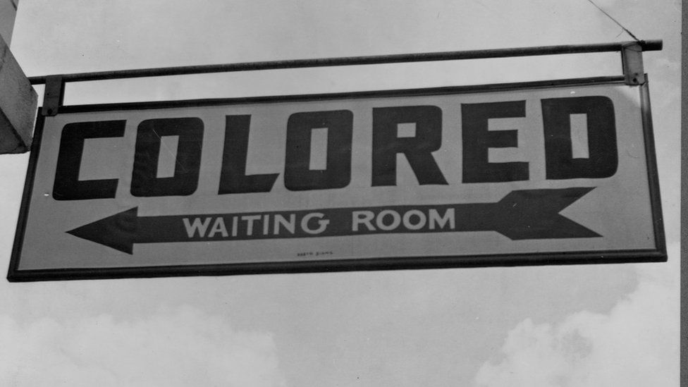Sign saying colored waiting room