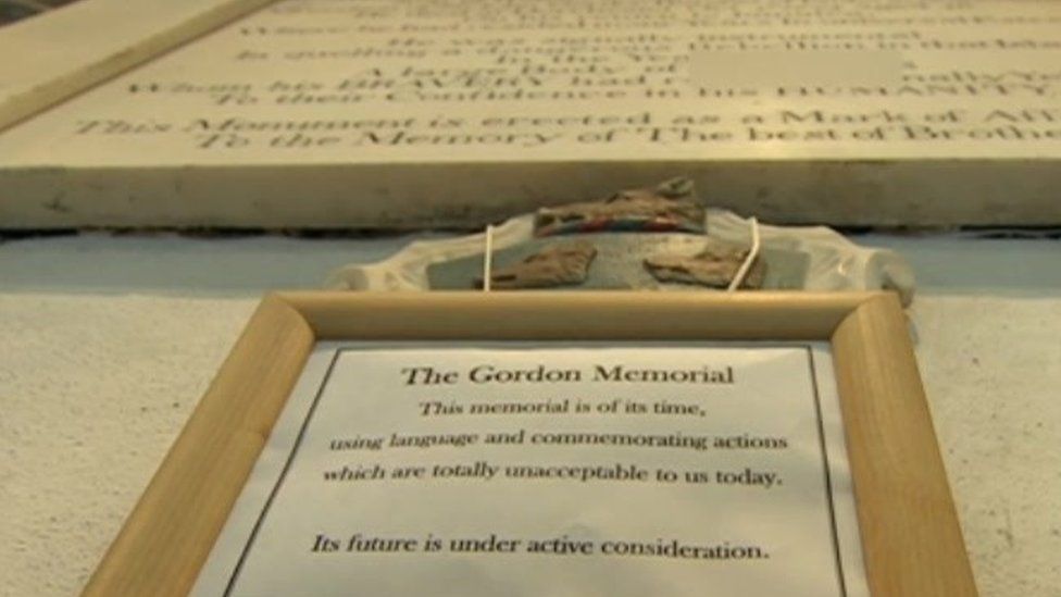 A notice placed under the memorial stone to John Gordon in St Peter's Church in Dorchester