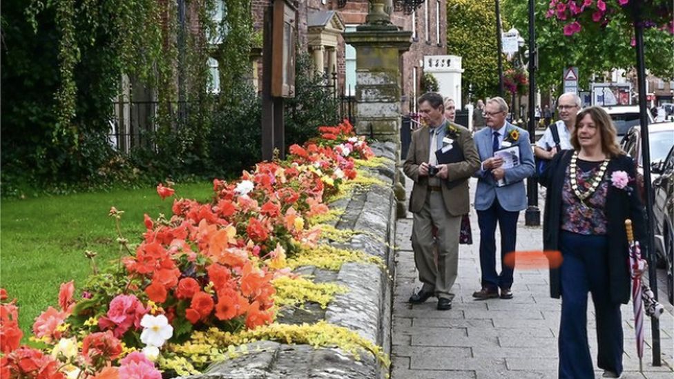 Looking at the flowers