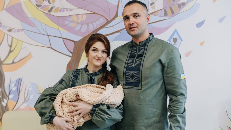 Mariana with husband Vasyl and baby