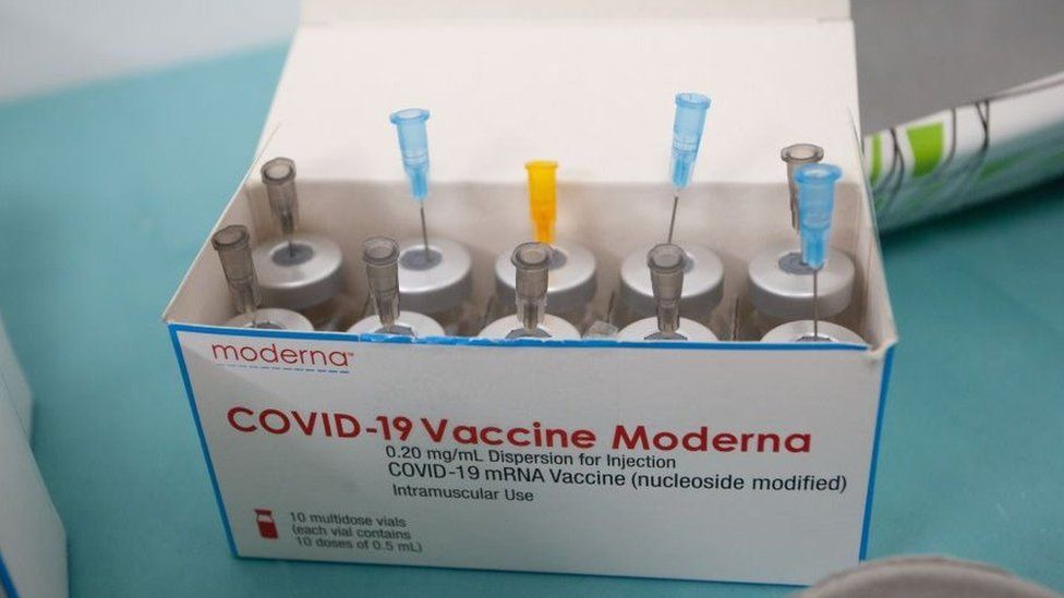 Empty Moderna Vaccine Flasks in a box