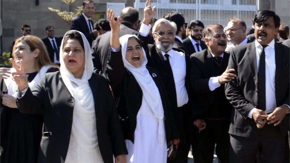 Lawyers, supporters of former three-time prime minister Nawaz Sharif, react after the Islamabad High Court granted protective bail to Sharif, in Islamabad, Pakistan, 19 October 2023.