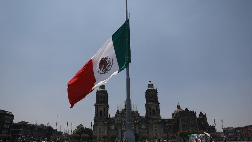 Mexican flag at half mast