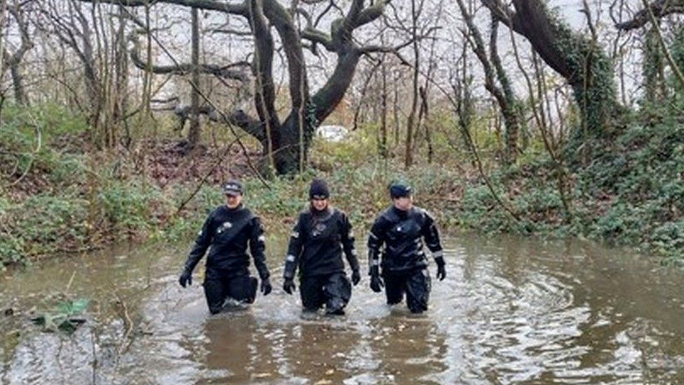 Officers search in water