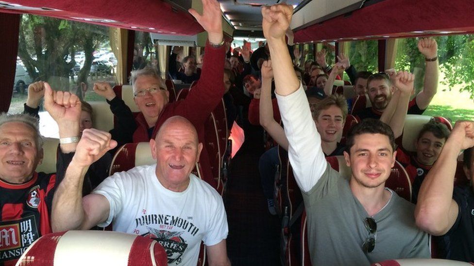 Fans on one of the coaches to Manchester