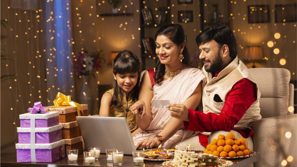 Family internet shopping at Diwali
