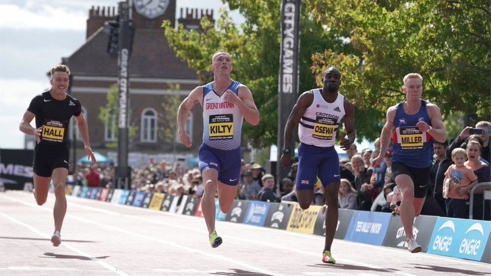 Great Britain's Richard Kilty (second left) wins the men's 100m