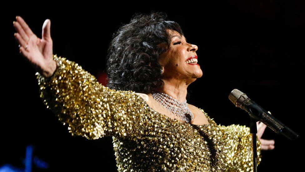 Dame Shirley Bassey performs on stage accompanied by The Royal Philharmonic Concert Orchestra during The Sound of 007 in concert at The Royal Albert Hall on October 04, 2022