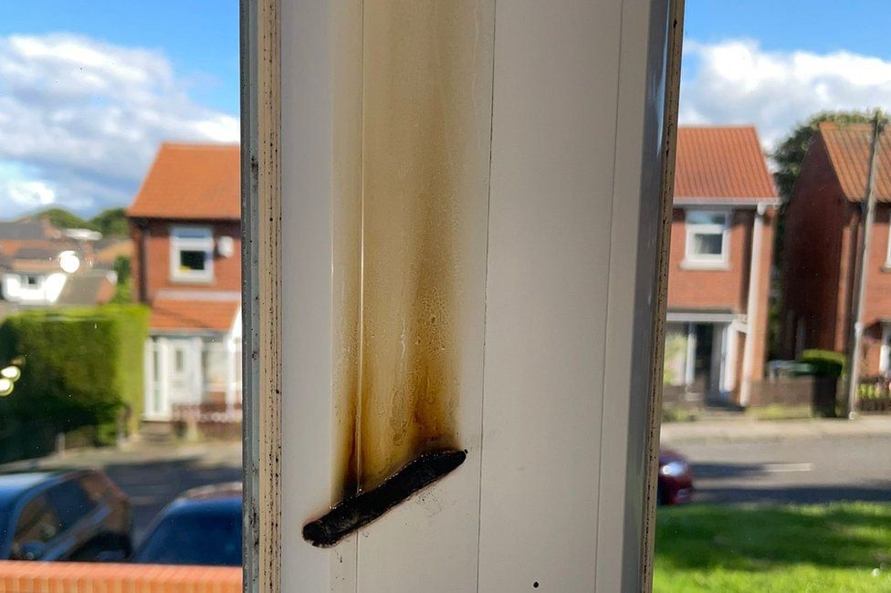 Fire damage to the window frame