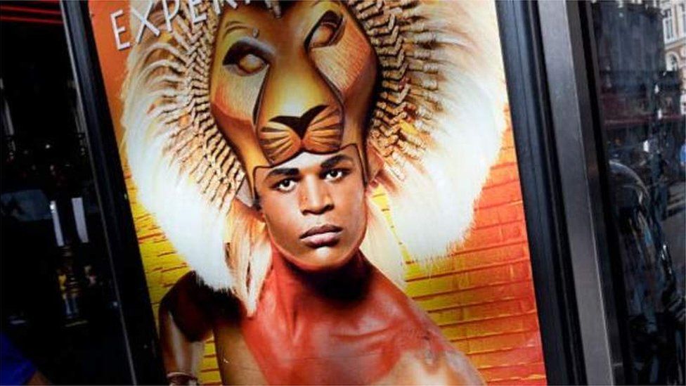 Andile Gumbi on poster for The Lion King musical