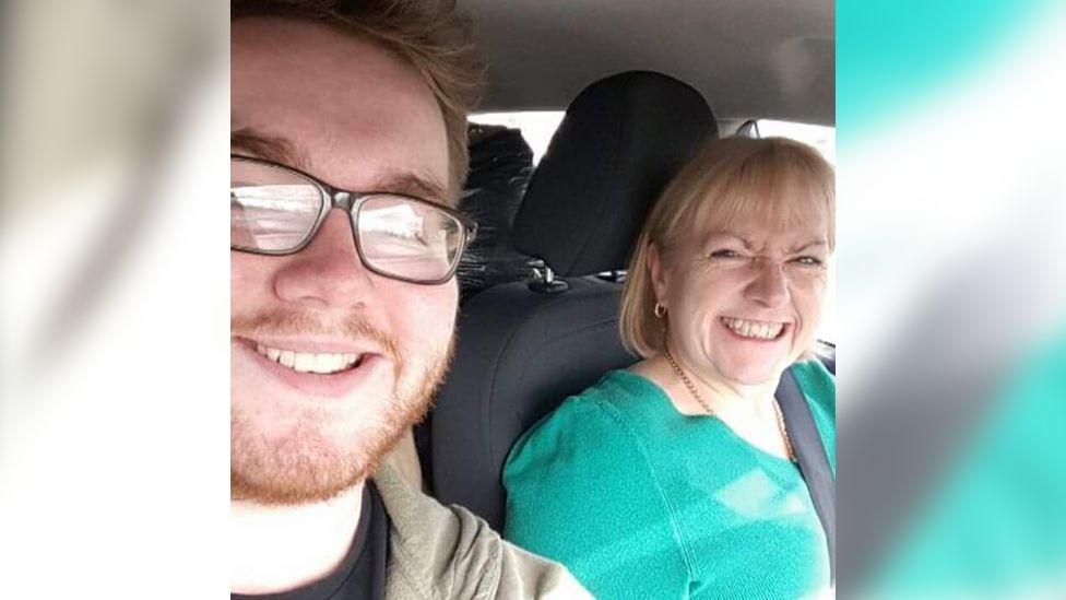 A selfie of Matt and his Mum in the car