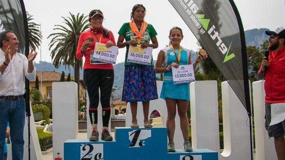 María Lorena Ramírez at the podium