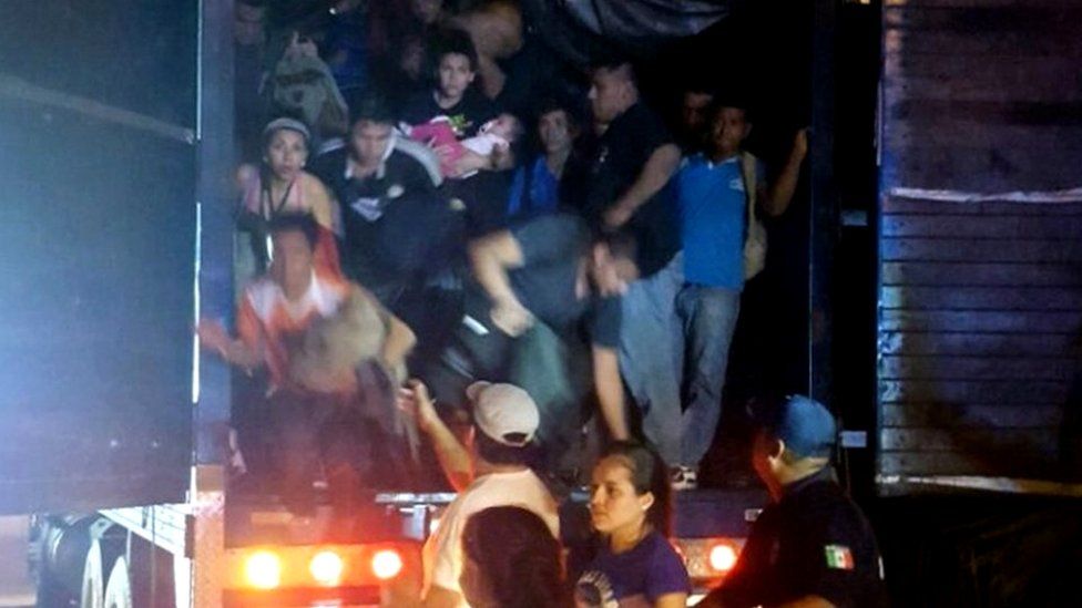 A handout picture provided by the National Institute of Migration of Mexico (INM) shows a group of migrants found by authorities in a truck, at a checkpoint in the highway connecting Villahermosa to Cardenas, Tabasco State, Mexico, 20 October 2016