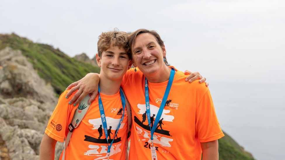 Islanders urged to bring UK family to charity walk BBC News