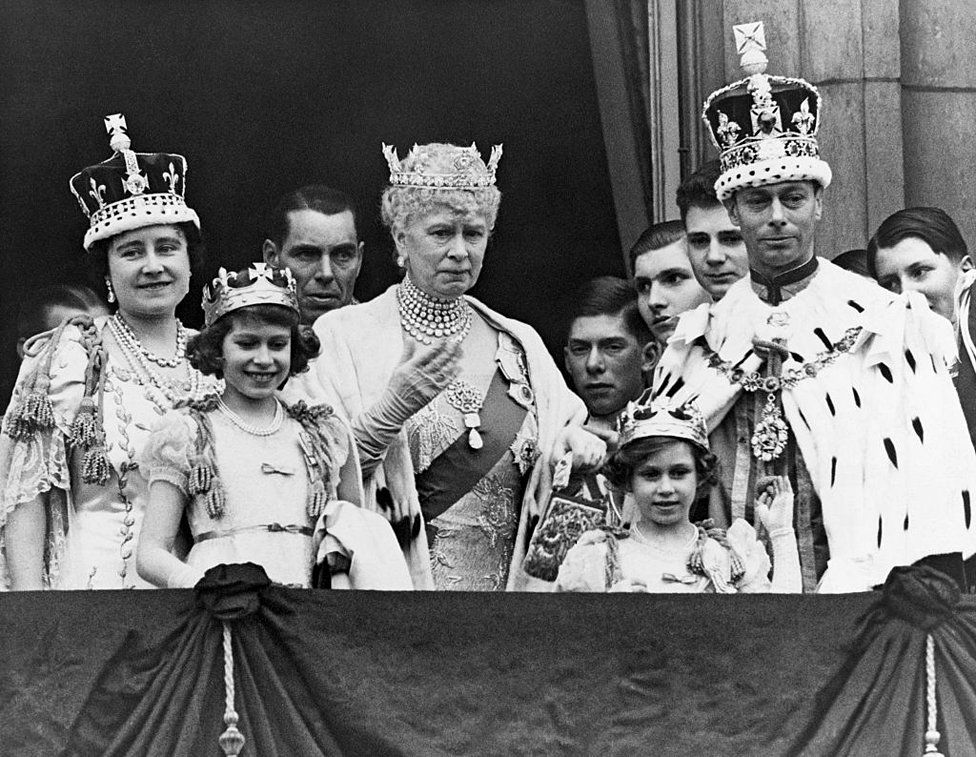 The Royal Family on the balcony at Buckingham Palace after the coronation of King George VI of England. Shown are (from left to right): Queen Elizabeth; Princess Elizabeth; Queen Mary the Queen Mother; Princess Margaret; and King George VI.